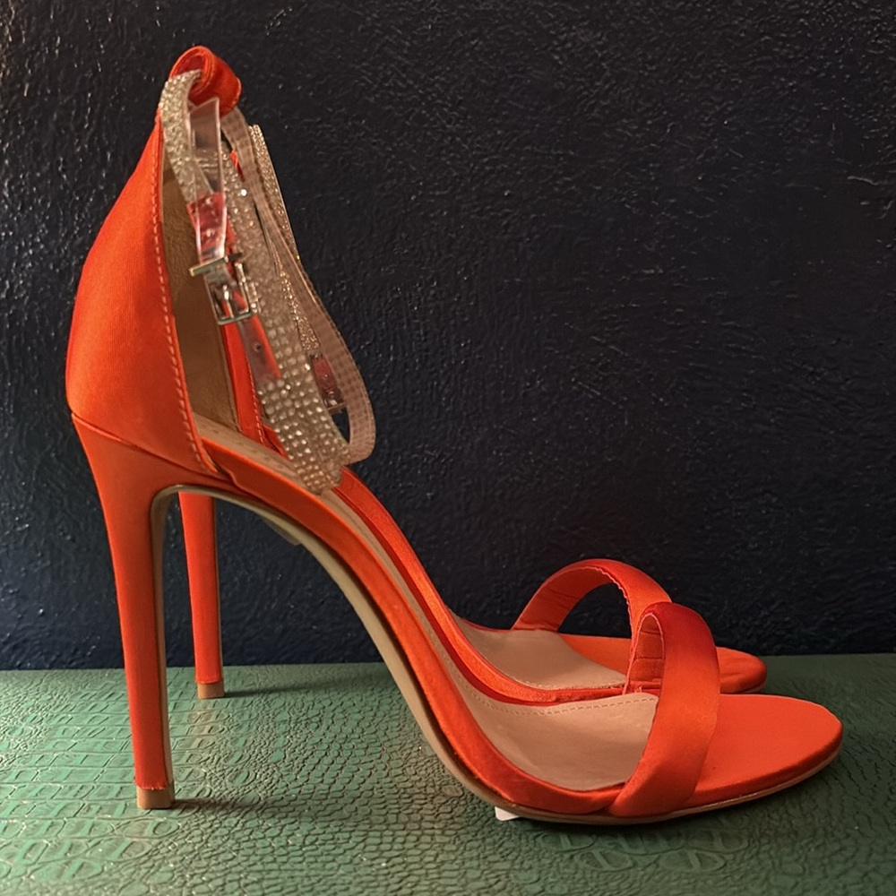 SCHUTZ Leanna flame orange satin sandal with rhinestone ankle strap and stiletto